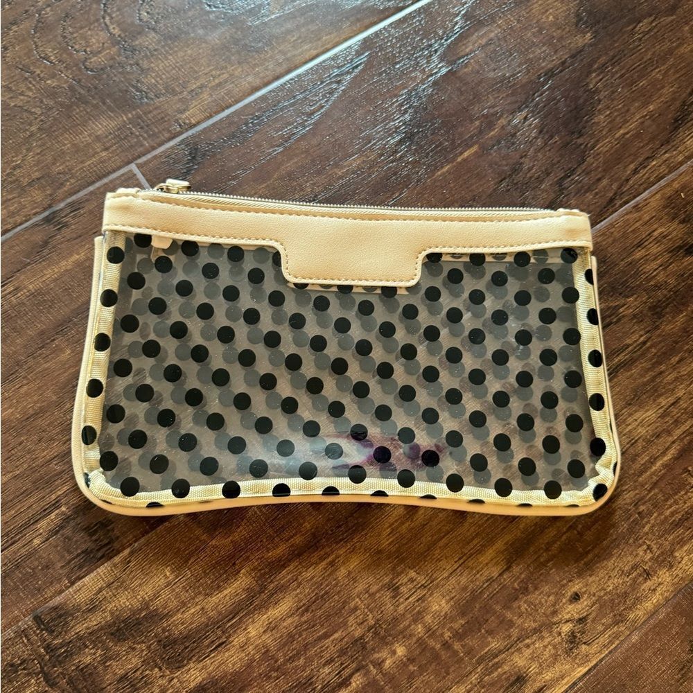 See-through black and tan polkadotted cosmetic bag